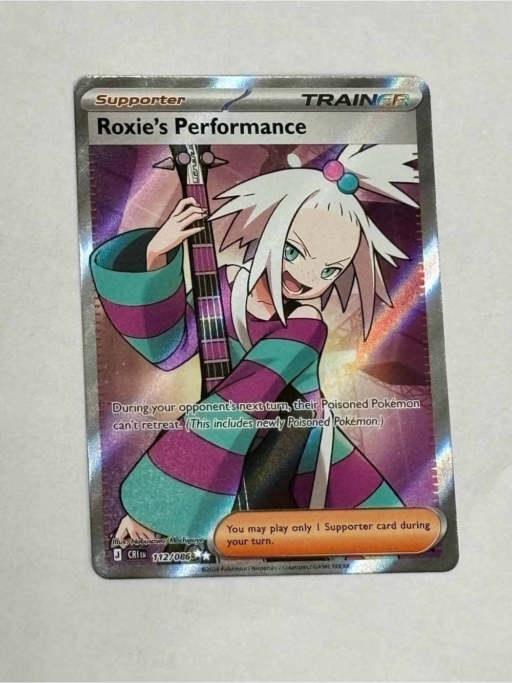 Pokemon Roxie's Performance Holo Trainer Card - Purple, Teal, Black, White